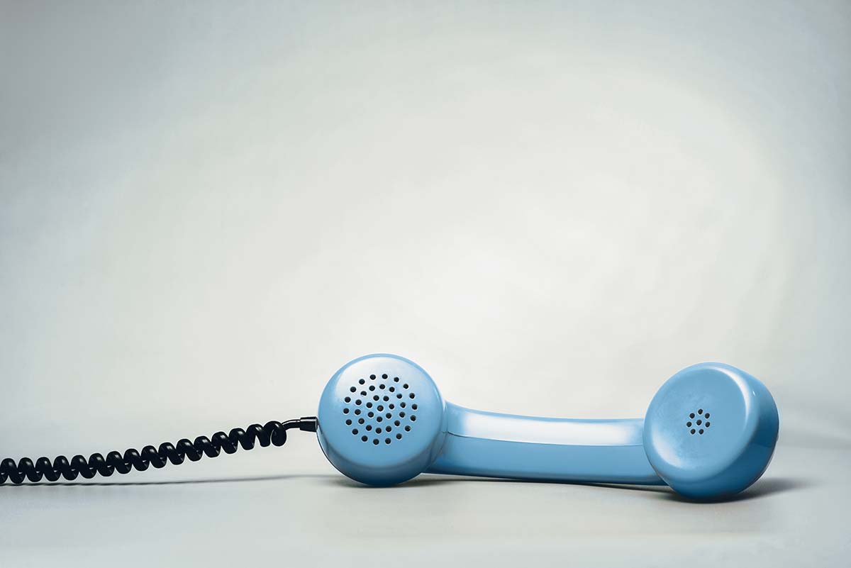 A light blue analog phone representing the evolution of telecom. What is Telecom Expense Management for landline services and outdated telecom technologies.